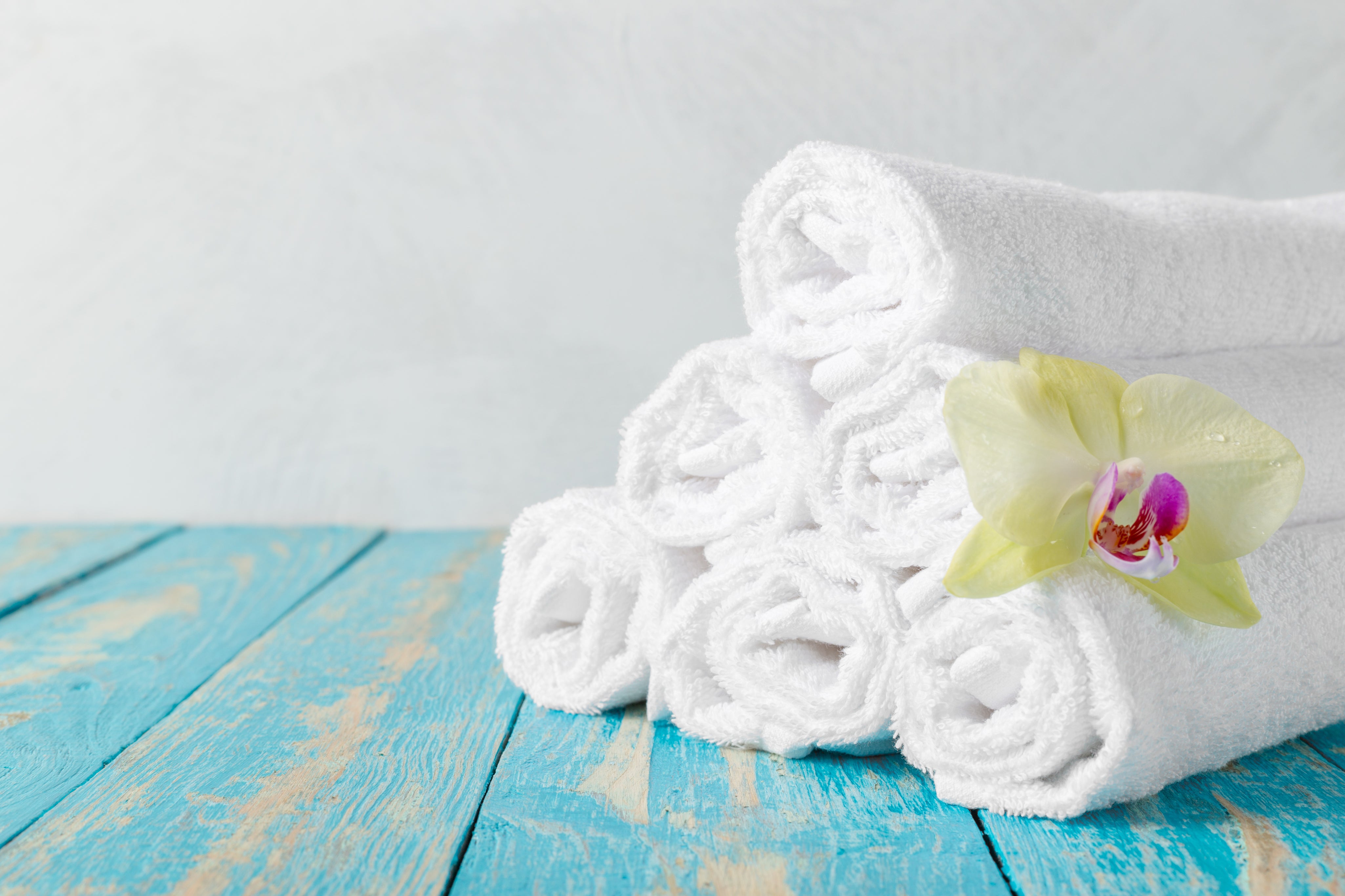 towels-with-orchid-flower-2025-02-24-13-47-55-utc.jpg